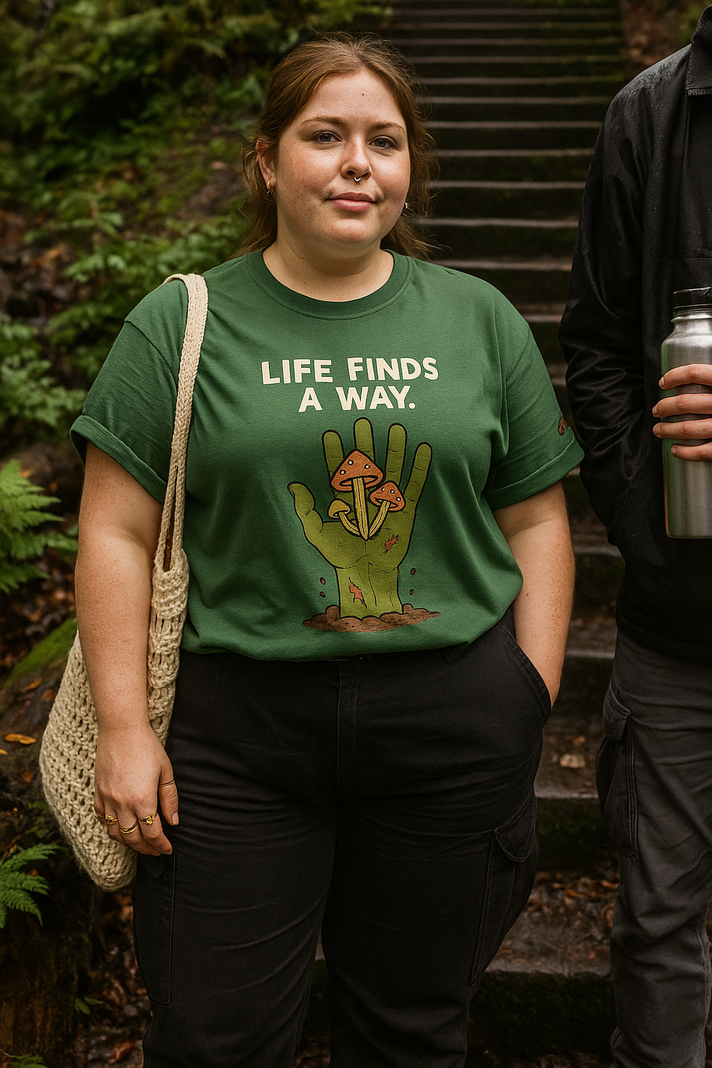 Unisex Life Finds a Way T-Shirt - Darkly Whimsical Zombie Hand & Mushroom Design - Funny Horror Tee for Nature Lovers